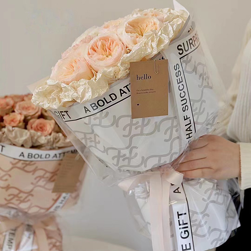 বিভিন্ন রঙের ব্র্যান্ড-নাম হেরা ফুলের মোড়ানো কাগজ